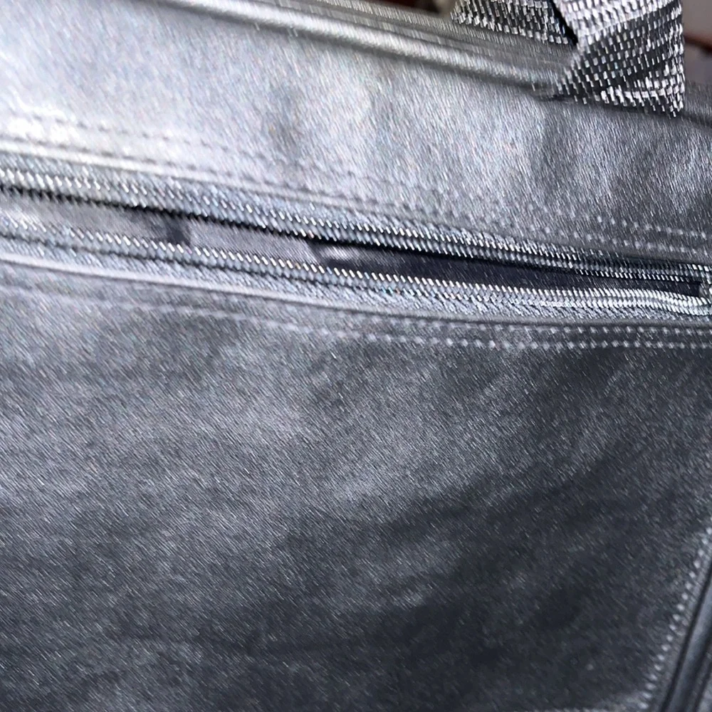 Briefcase, Black, Handles and Shoulder Straps lots of storage.